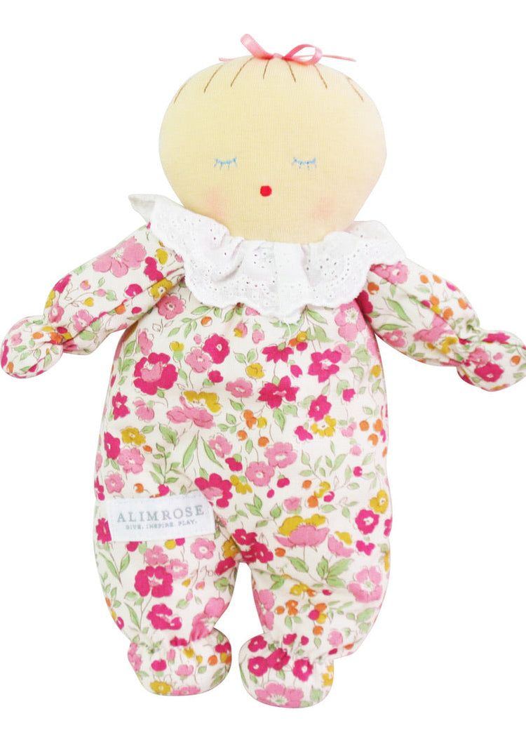 Curated baby girl toys including plush toys, rattles, teethers, and sensory gifts for newborns and infants