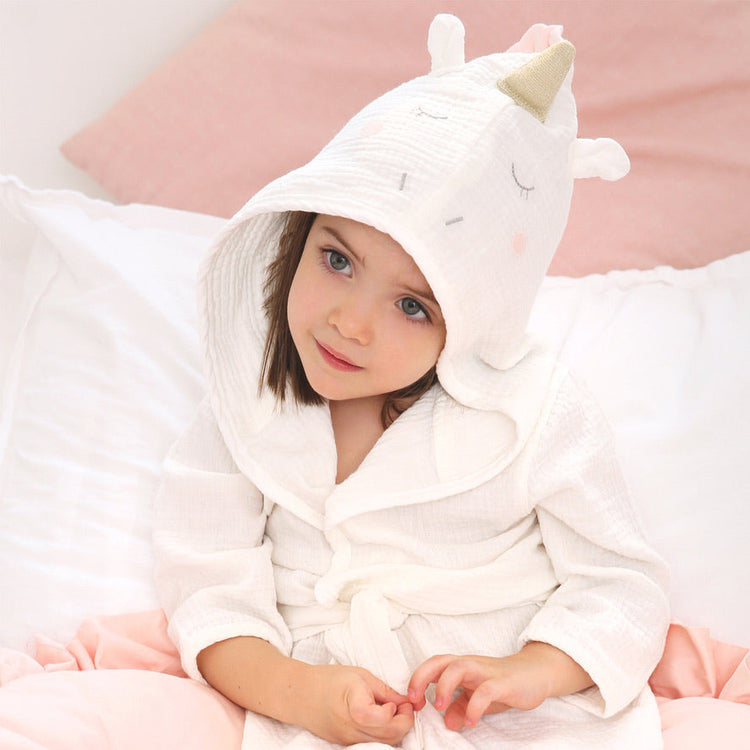 Child wearing Unicorn Organic Cotton Robe during bath time and lounging